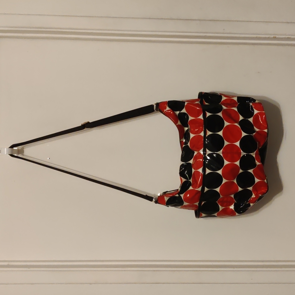 Kate Spade Daycation Bag. Red / Black / Circles.